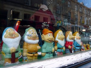 garden knomes of the seven dwarfs in shop window