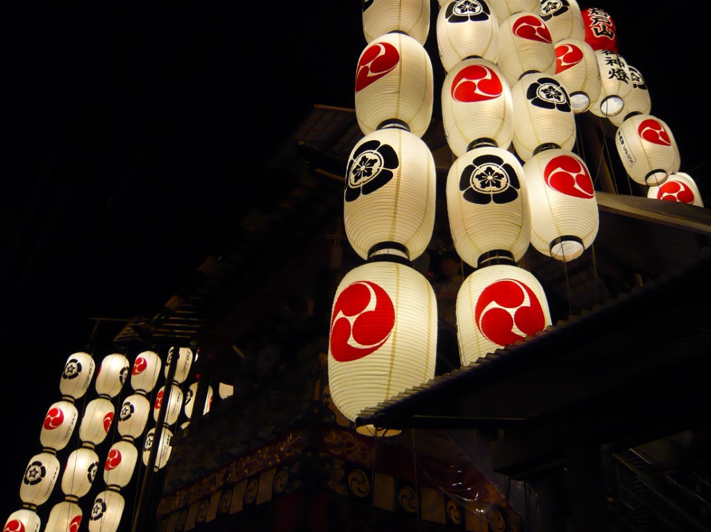 bright paper lanterns against a dark background - part of Gion Matsuri festival during 'yoiyama' evenings